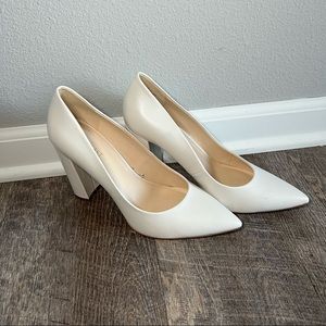 Classic white pumps